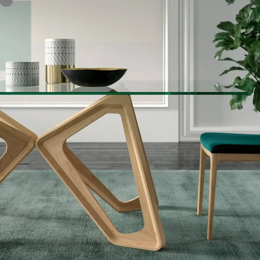 Exceptional Ozzio Italia Papillon table with a sinuous light-toned wooden base and clear glass top crafted in Italy