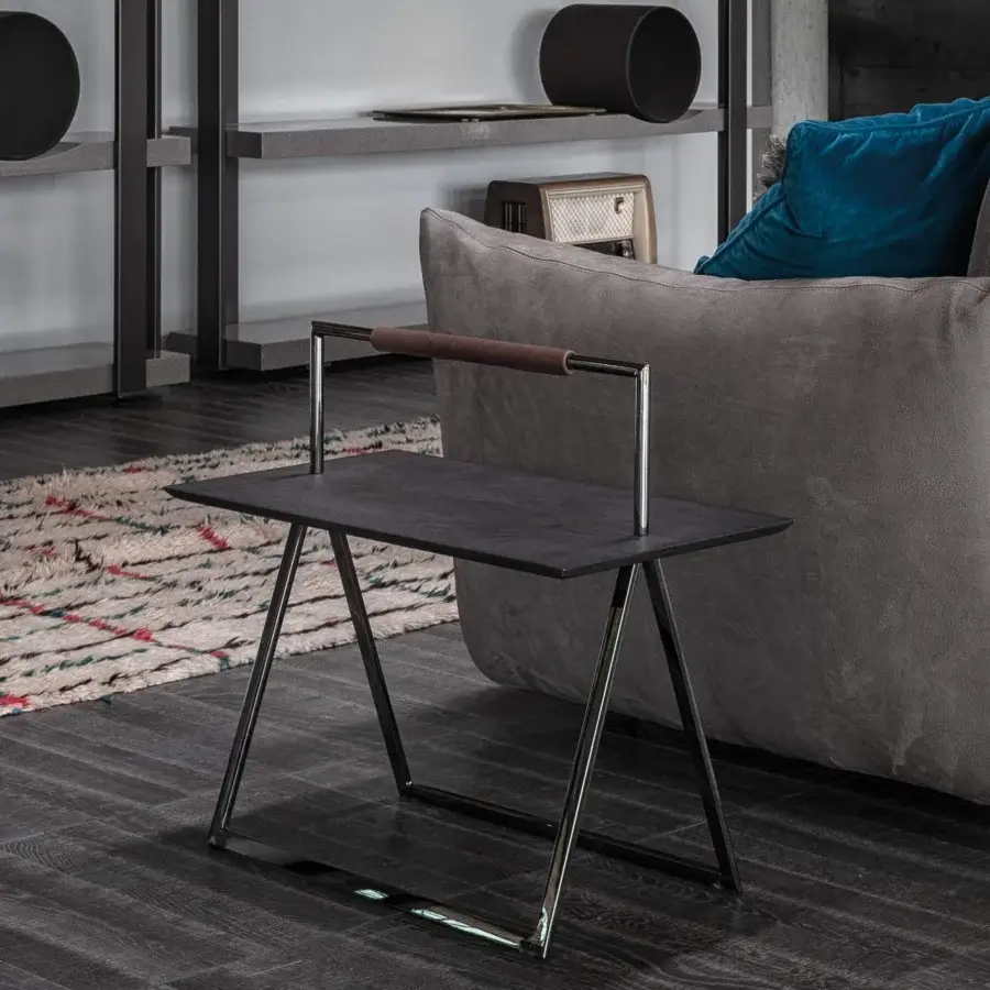 Distinguished Cierre1972 Nadir side table with a dark stone-like tabletop and glossy chrome-toned metal crafted in Italy