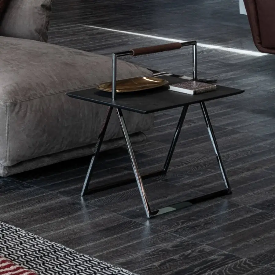 Distinguished Cierre1972 Nadir side table with dark matte square tabletop and sleek metal A-shaped legs crafted with a leather-covered handle