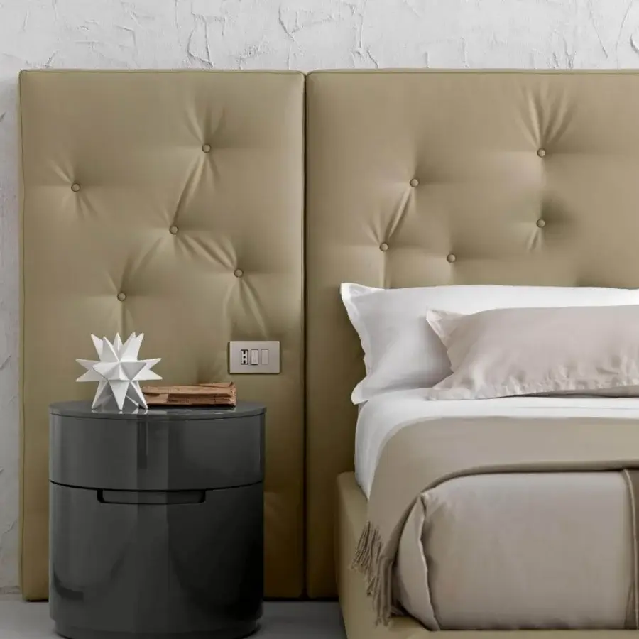 Elegant Presotto Globo nightstand in curved plywood with glossy dark gray finish and integrated handles