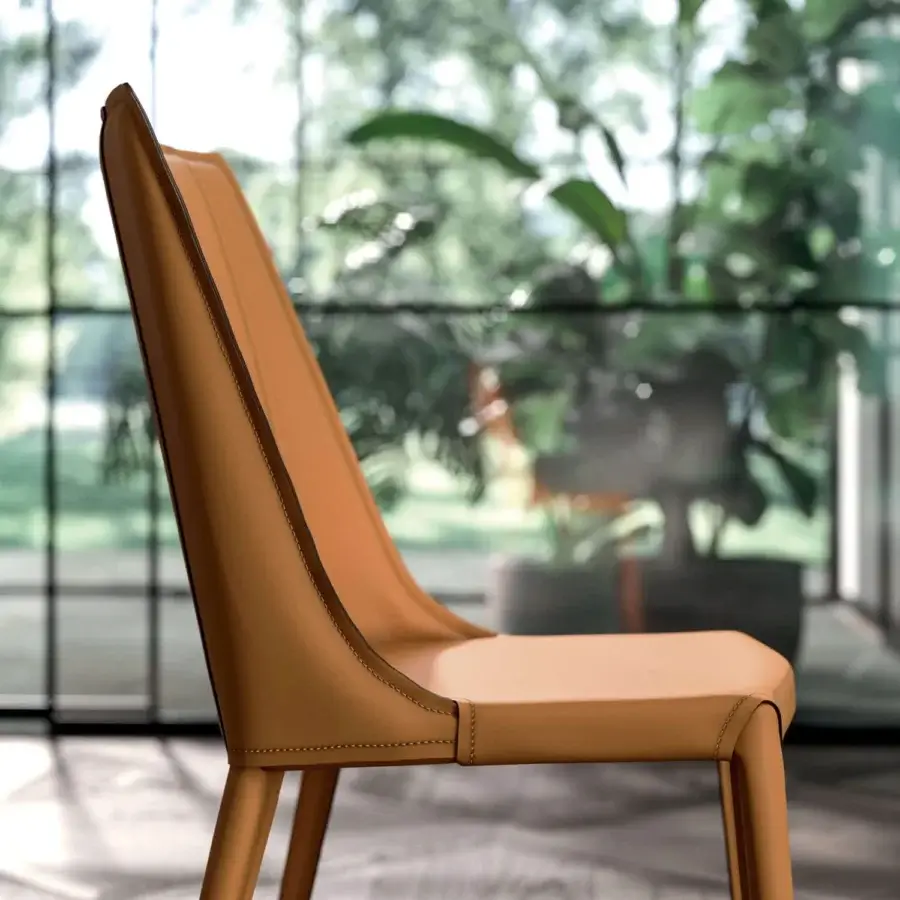 Elegant Ozzio Italia Loren chair crafted with light tan leather and darker brown stitched detailing