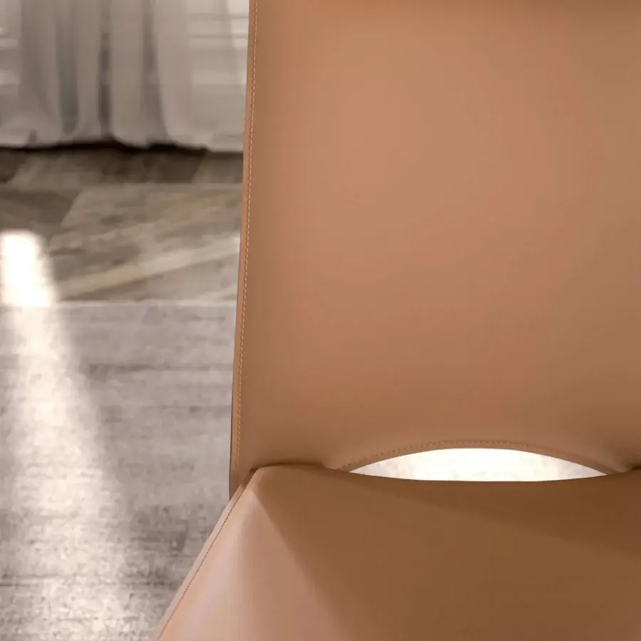 Distinguished Ozzio Italia Viva chair handcrafted in Italy with curved backrest and smooth monometric coating in light tan finish