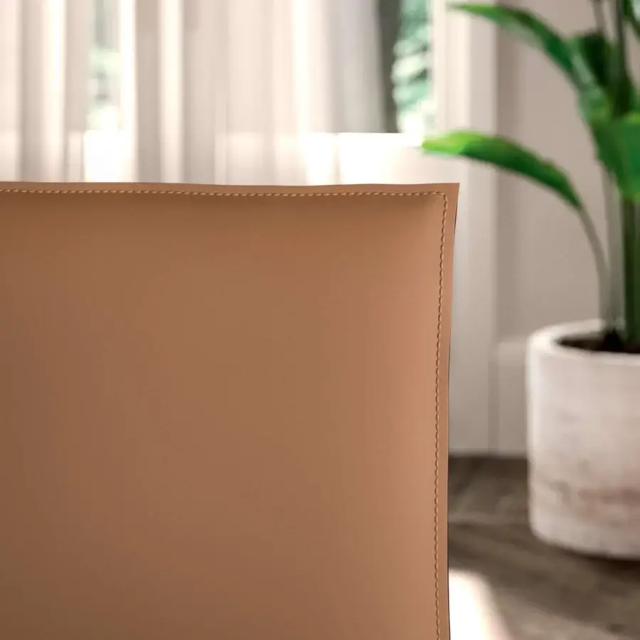 Elegant Ozzio Italia Viva chair crafted in Italy with uniform tan synthetic material and smooth finish