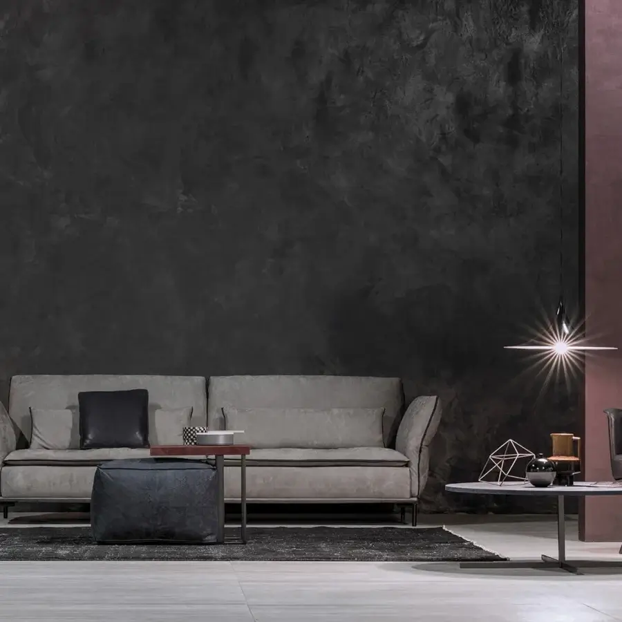 Captivating Cierre1972 Simply sofa with light gray textile upholstery, quilted armrests and dark piping creating an inviting aesthetic