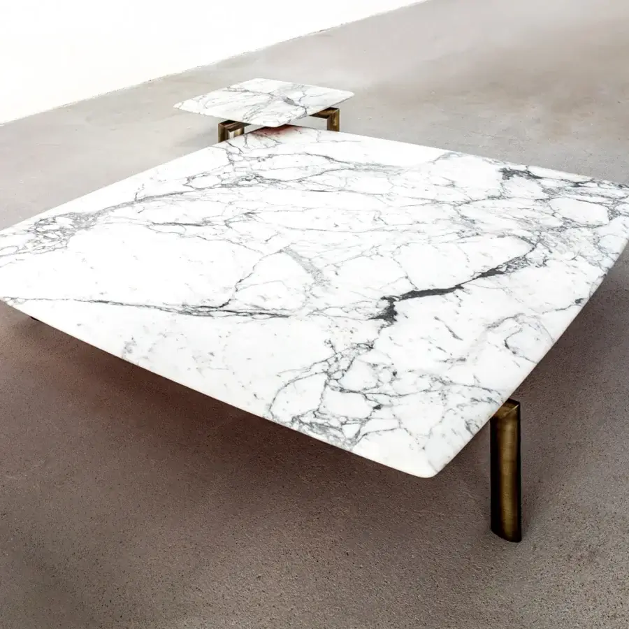 Elegant Casa Casati Sasso coffee table built with polished polyester lacquer marble and bronze-toned metal legs