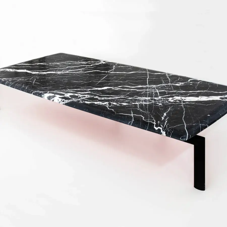 Superior Casa Casati Sasso coffee table crafted with dark marble and matte metal, finished in protective polyester lacquer with white veining