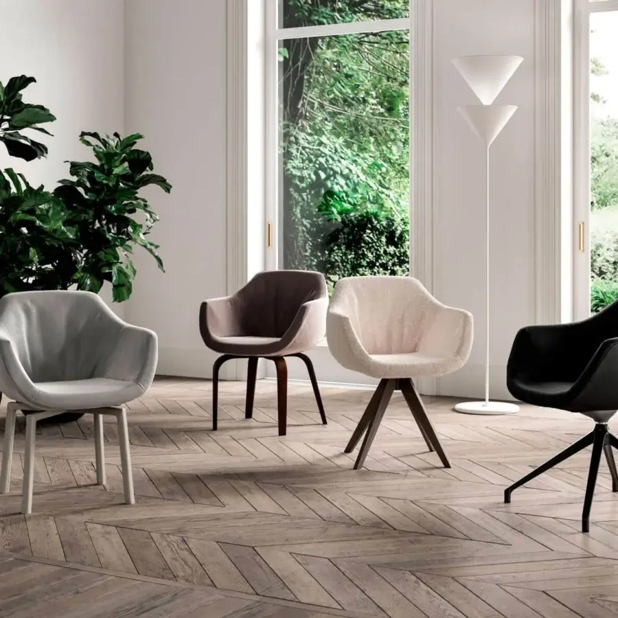 Distinguished Ozzio Italia Delia - Halia armchair with curvilinear armrests and a supportive wood-like base in grey textile upholstery