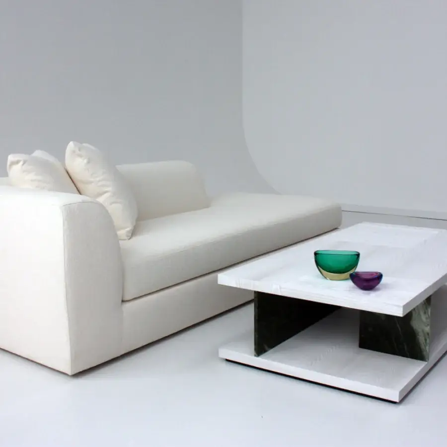 Architectural Casa Casati Barcelona coffee table crafted with white wood grain and dark textured supports