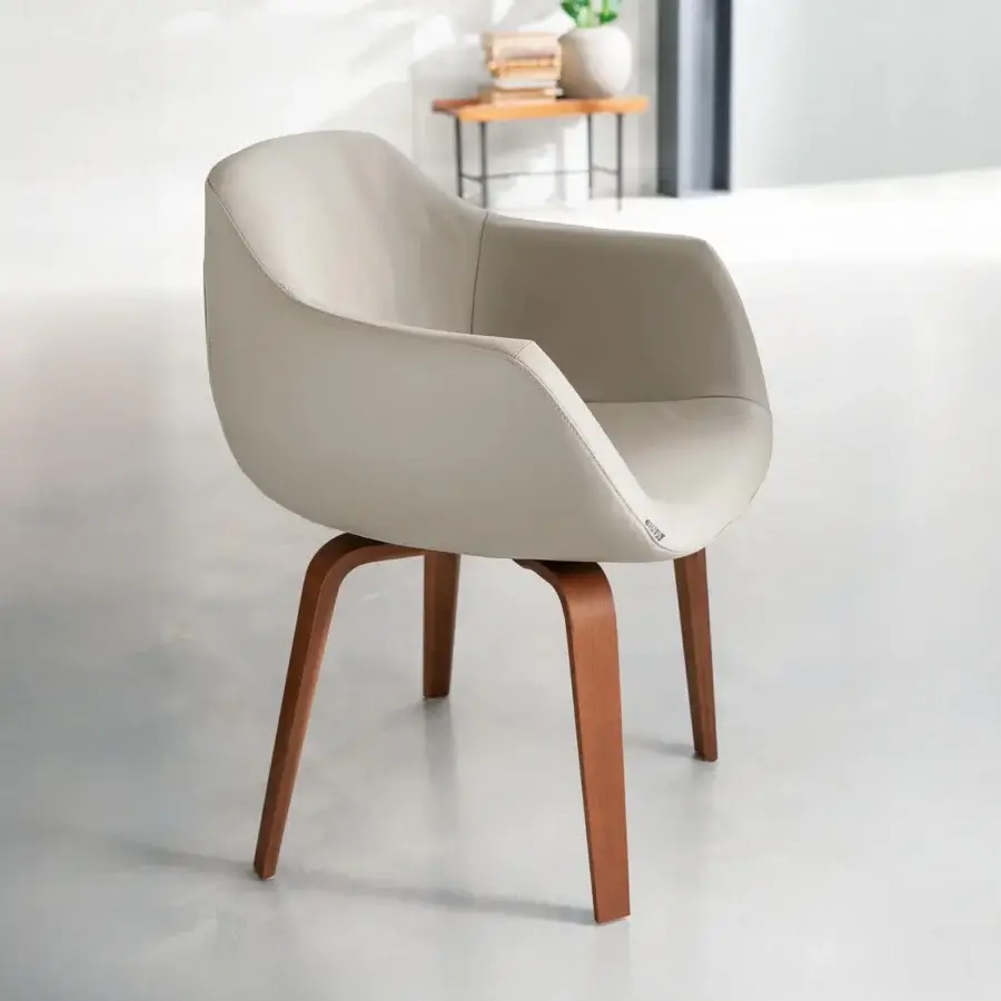 Exceptional Ozzio Italia Eliot armchair with comfortably curved form in light gray upholstery and warm brown wooden base