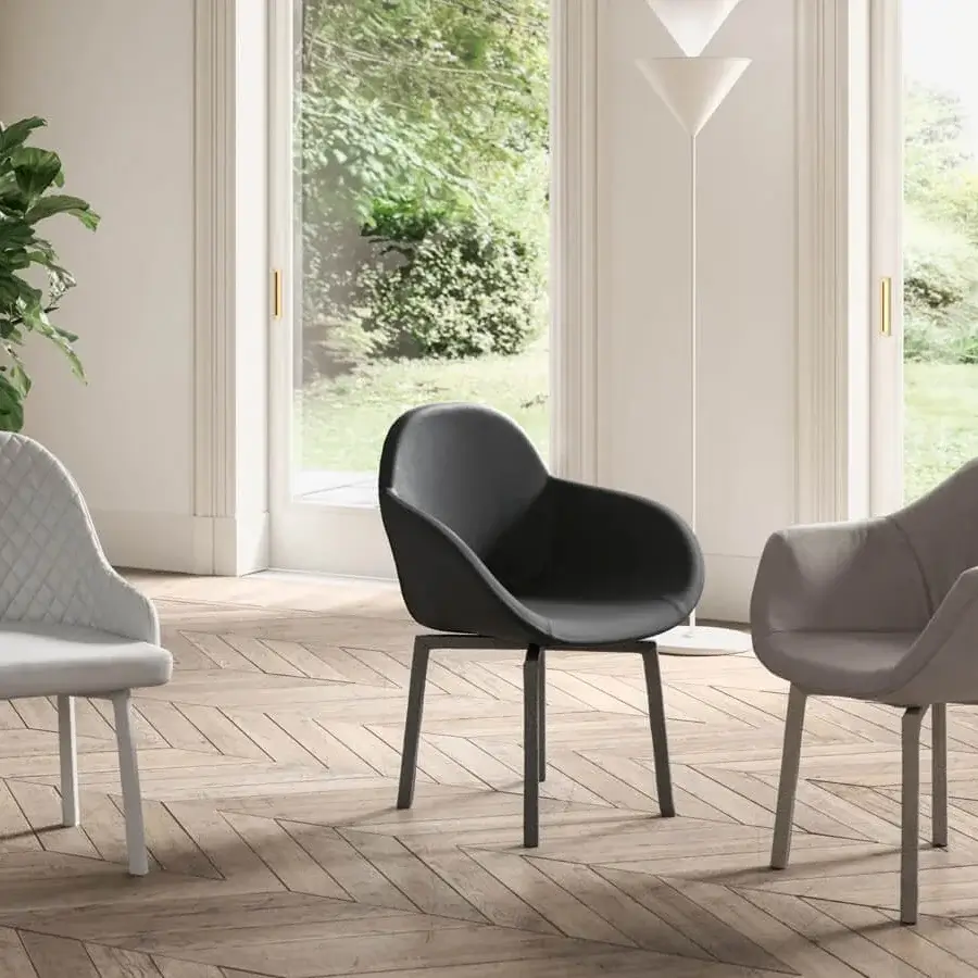 Superior Ozzio Italia Eliot armchair crafted with matte light grey textile and sleek metal legs