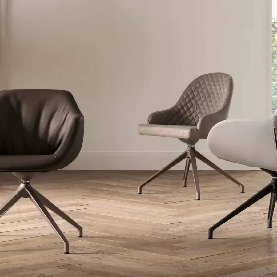 Elegant Ozzio Italia Olimpia - Gilda armchair with light gray textile upholstery and slender matte metal swivel base