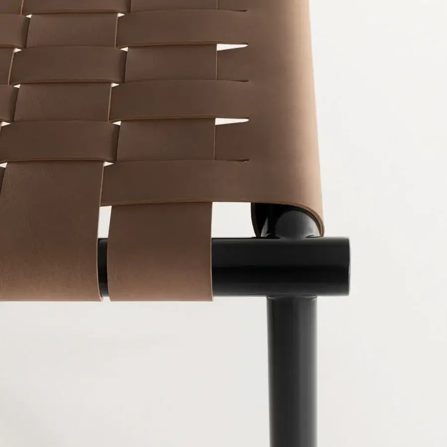 Distinguished Cierre1972 Jared bench with a black matte metal frame and handwoven medium brown leather seat