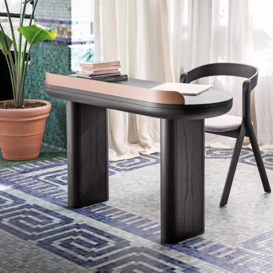 Exceptional Miniforms Jumbo desk crafted in Italy with matte black stained wood and light copper metal accents