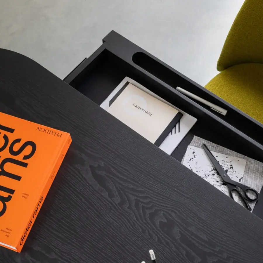 Superior Miniforms Jumbo desk crafted in Italy with a black wood-like surface and sleek metal accent offering discreet storage