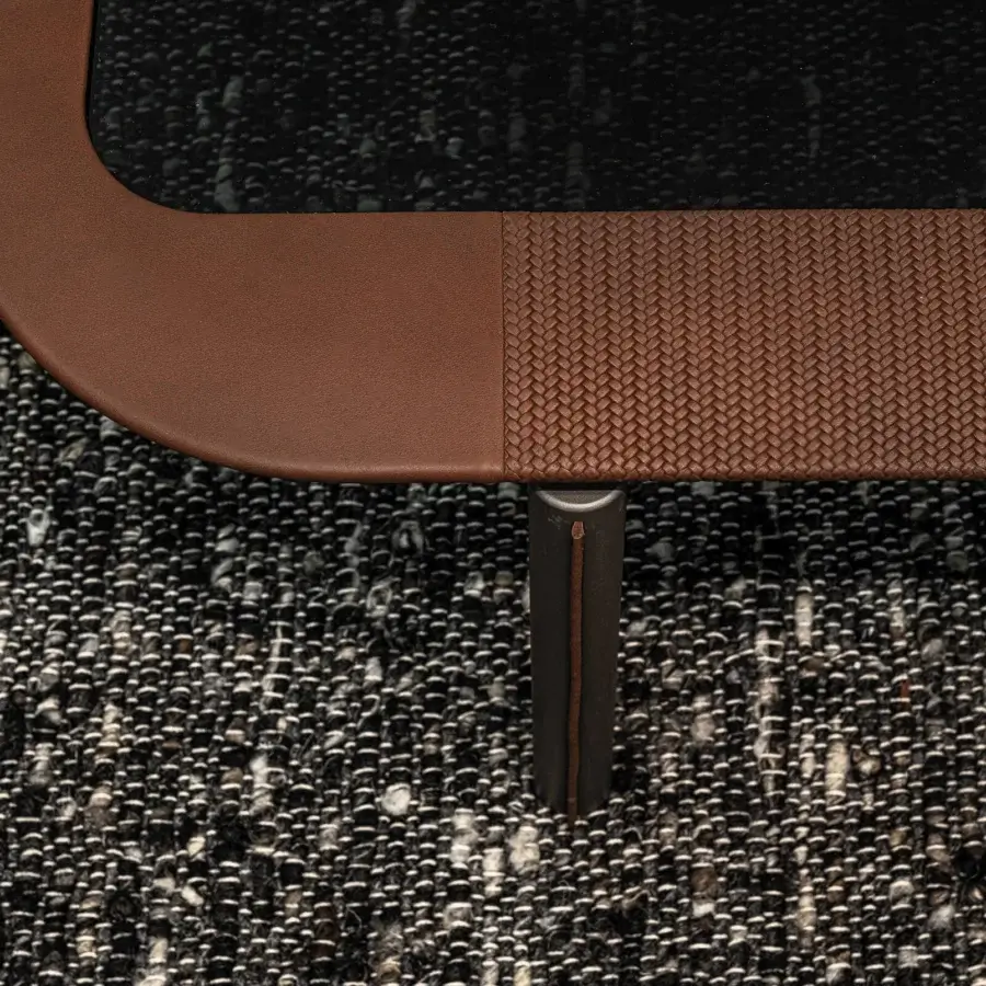 Distinguished Cierre1972 Edge coffee table with a black rectangular top and brown Leather edge built with varnished wooden legs