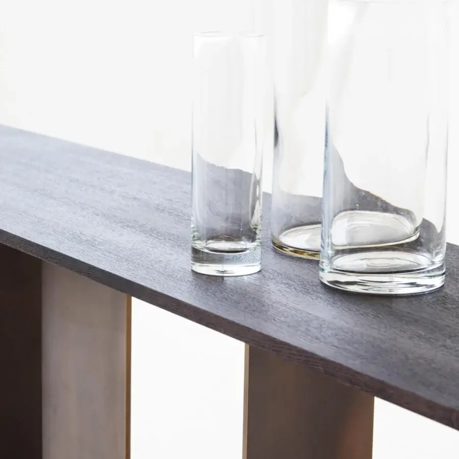 Superior Casa Casati Berlino console crafted with matte wood exhibiting visible grain and lighter toned vertical panels with orange lacquer