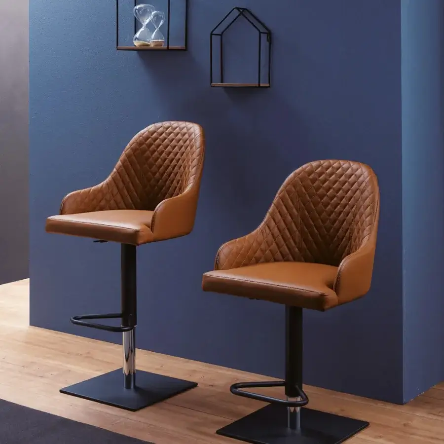 Superior Ozzio Italia Dylan-Brando-Prometeo stool with quilted brown synthetic upholstery and chrome finished footrests built with a metal base