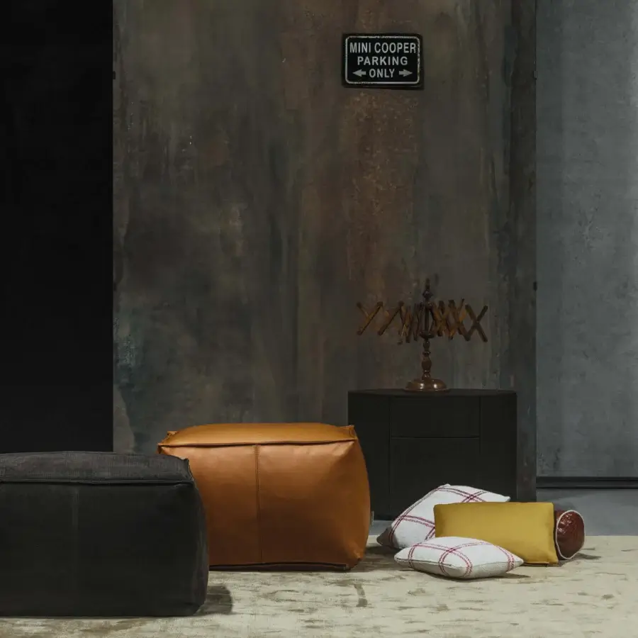 Exceptional Cierre1972 Soft Ottoman, a minimalist ottoman upholstered in smooth tan brown leather with a uniform finish