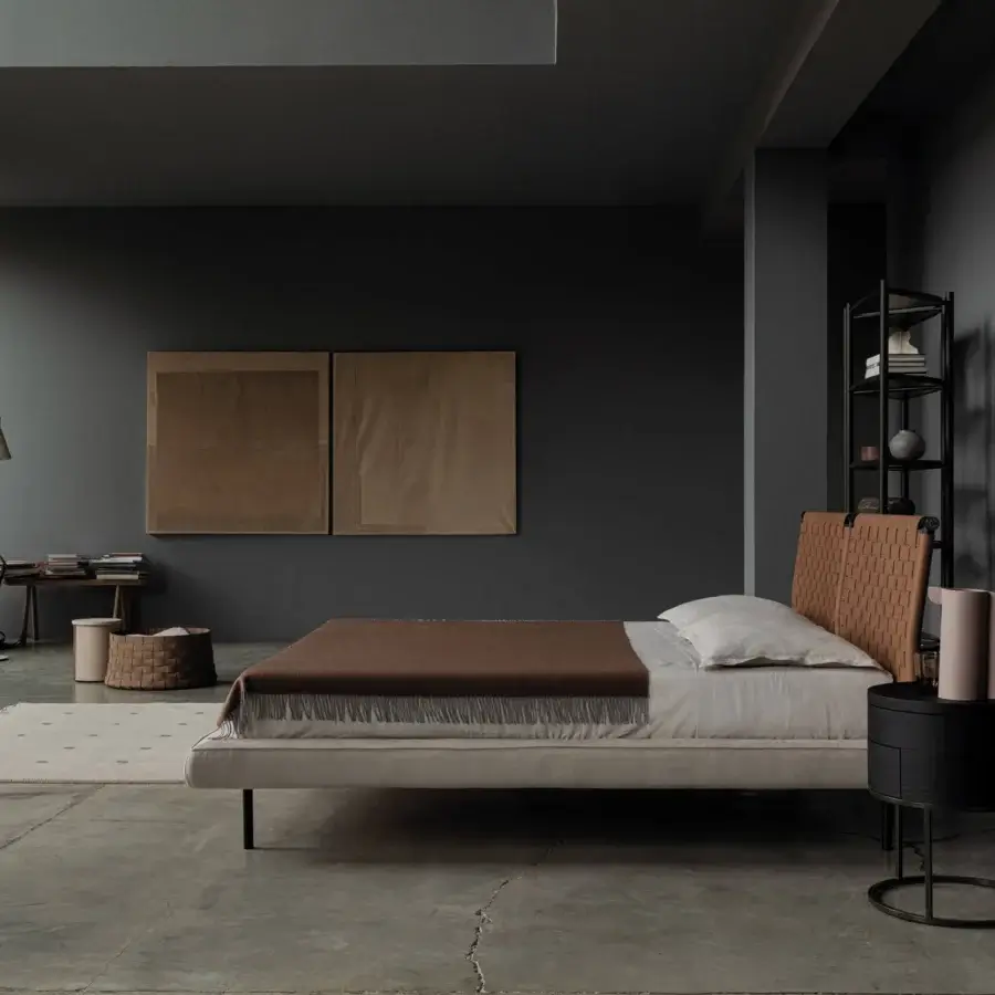 Superior Cierre1972 Jared bed with handwoven light brown leather headboard and upholstered base built with thin dark legs