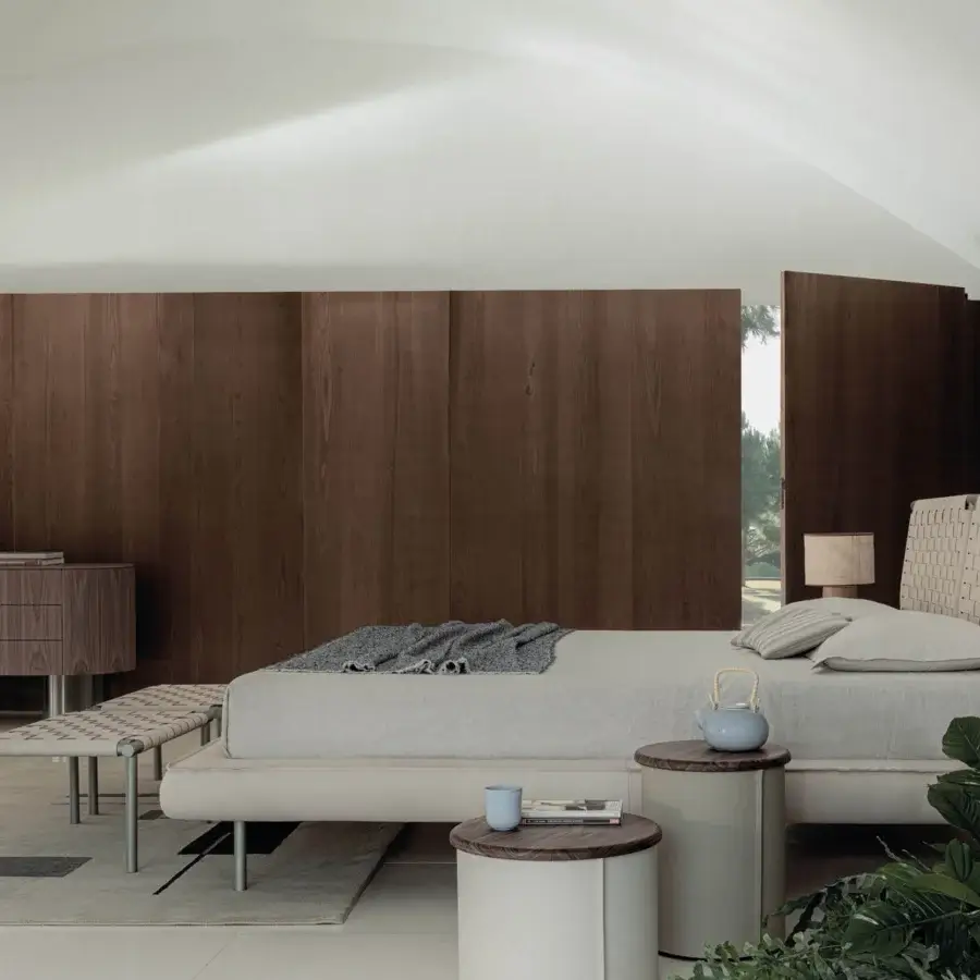 Superior Cierre1972 Jared bed with handwoven leather headboard and rational light gray textile upholstery