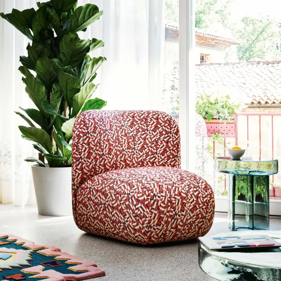 Superior Miniforms Boterina lounge chair in reddish-brown and off-white textile with angular pattern and seamless silhouette