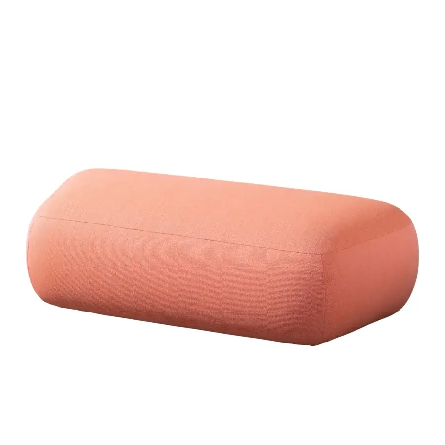 Elegant Miniforms Botera ottoman with a squishy seat upholstered in muted coral textured textile and matte finish