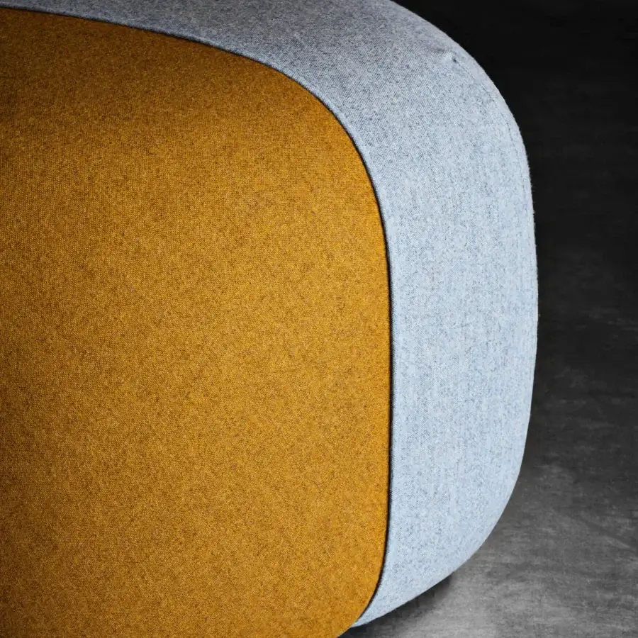Elegant Miniforms Furoshiki ottoman with oriental delicacy displaying mustard yellow and light blue patterned fabric upholstery