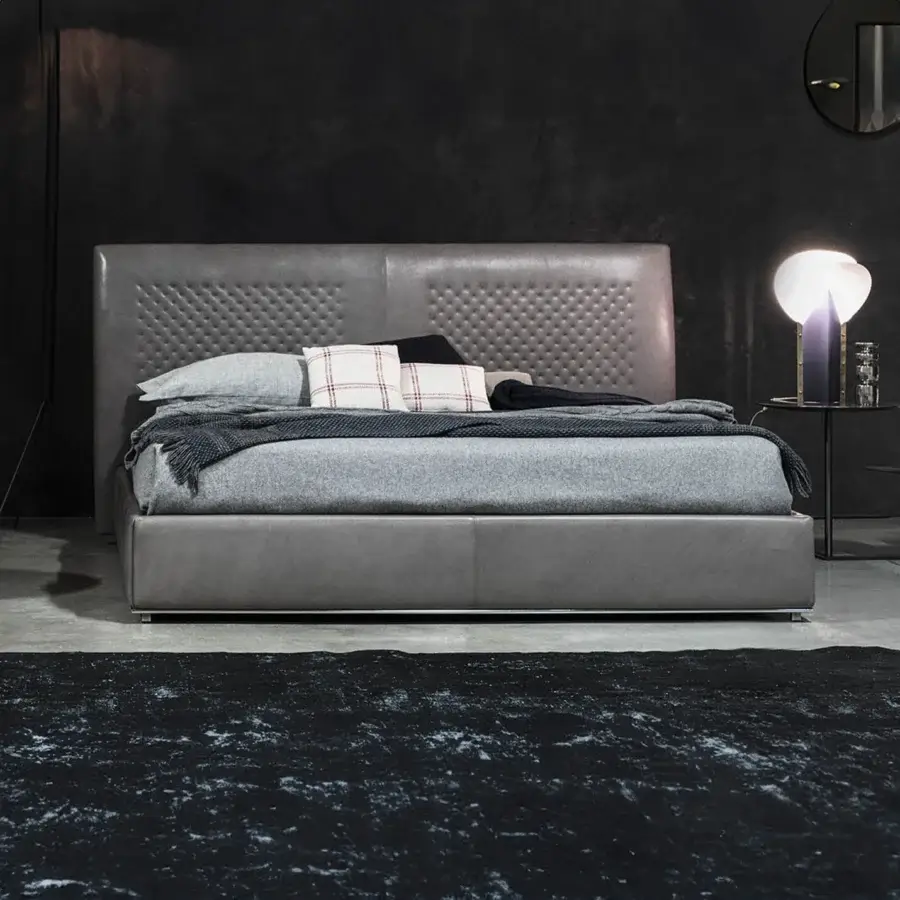 Distinguished Cierre1972 Chandelier bed with smooth grey upholstery and a hand-carved capitonné grid-patterned headboard crafted in Italy