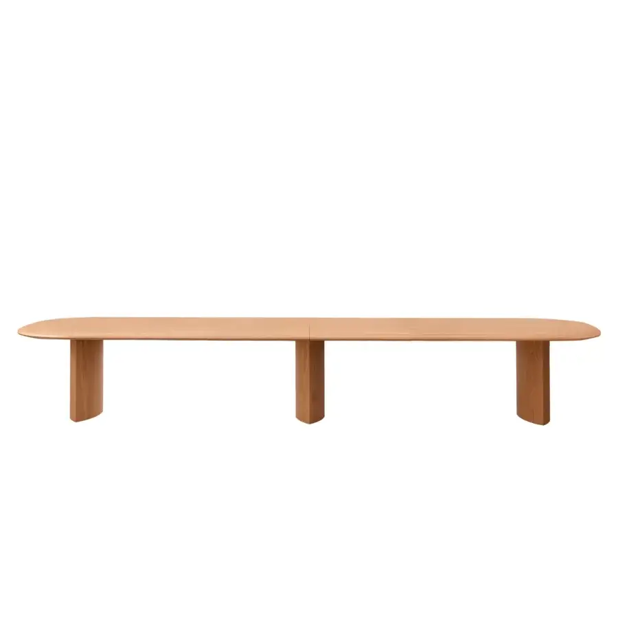 Elegant Miniforms Plauto Maxxxi conference table with light brown wood and a smooth matte finish