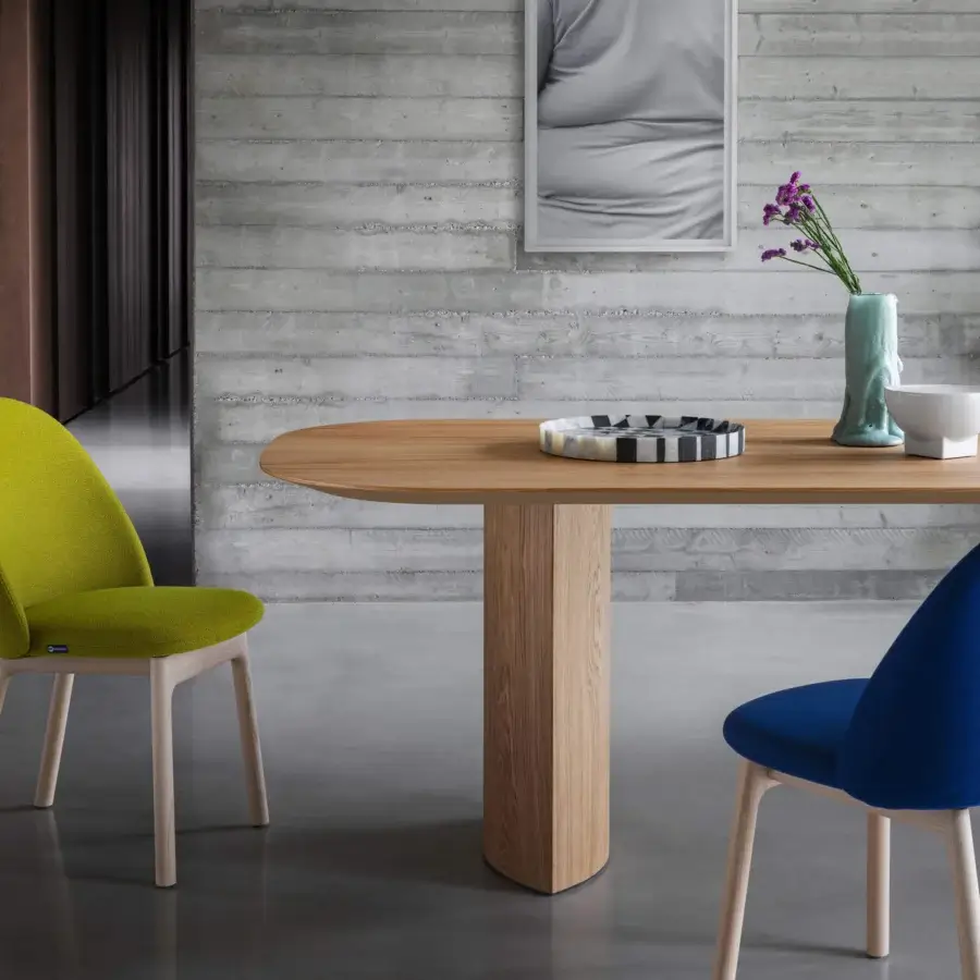 Distinguished Miniforms Plauto Maxxxi conference table in light to medium toned wood with minimalist pedestal base