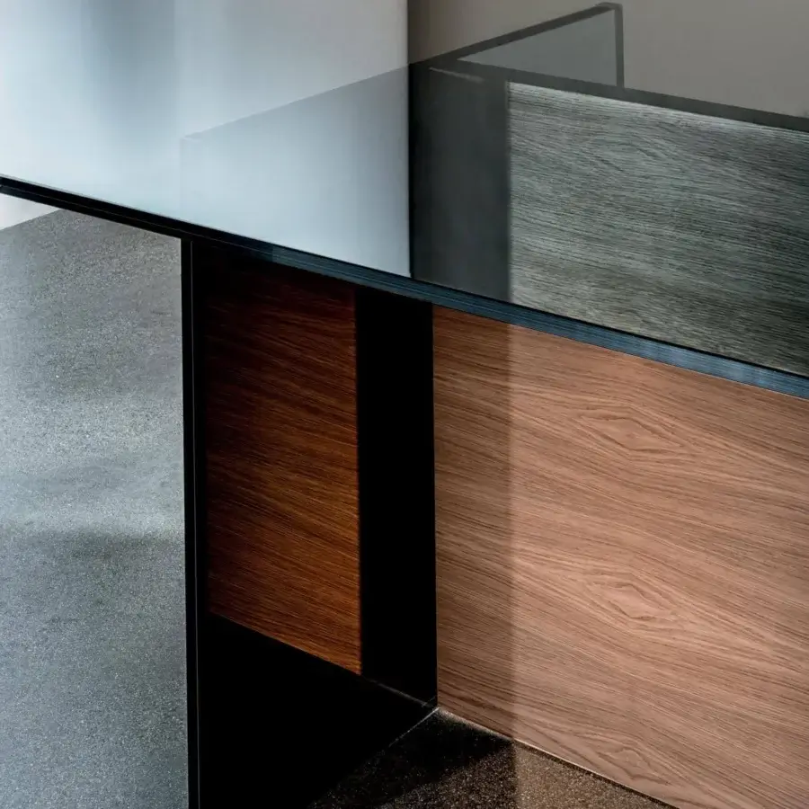 Exceptional Sovet Italia Regolo table with extra light clear laminated glass top and wooden base built with black lacquered glass