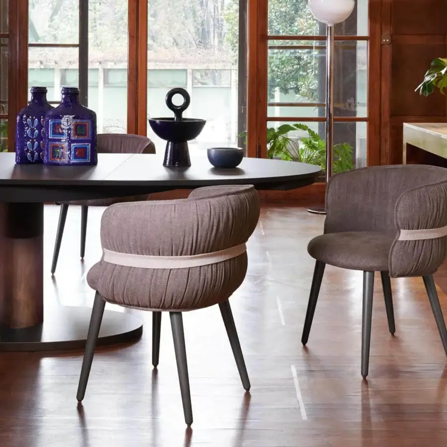 Distinguished Potocco Diva table with dark rounded rectangular top and oak metal circular base in dark matte finish