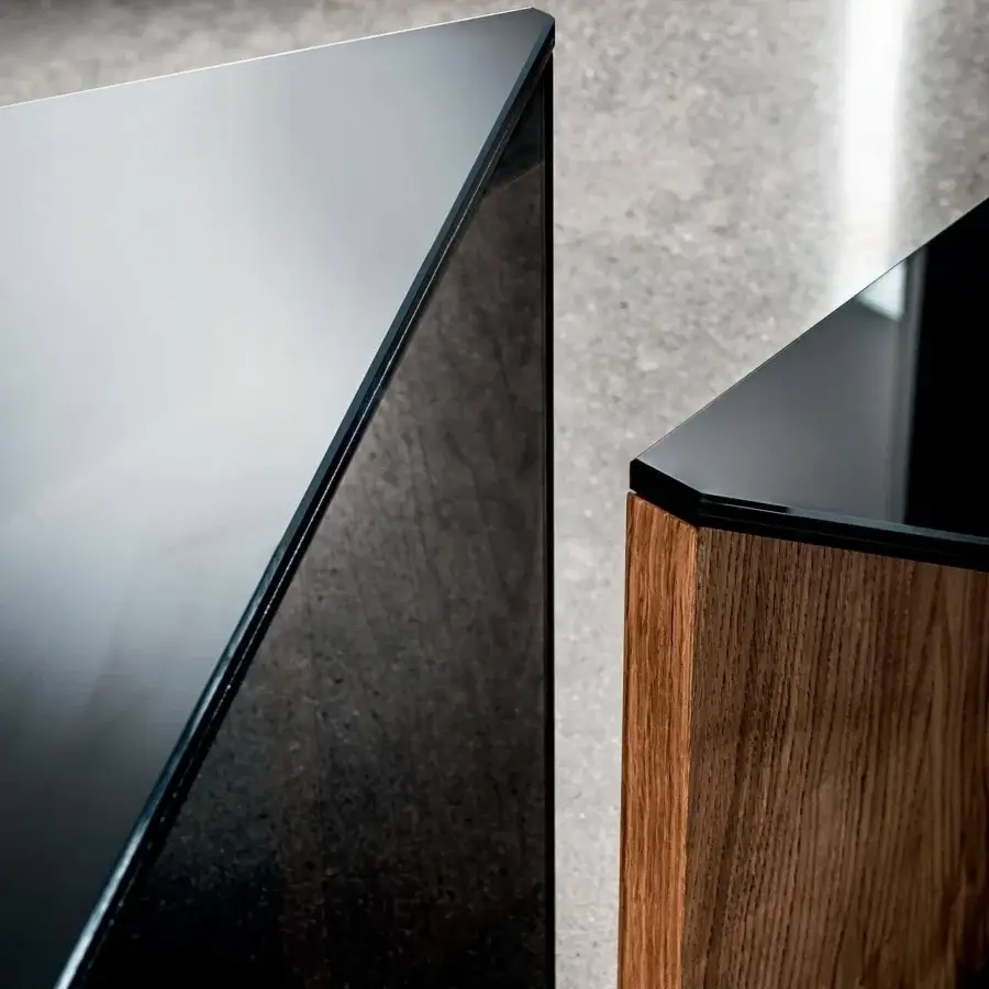 Distinguished Sovet Italia Regolo coffee table with a triangular black laminated glass top and smoked glass with black lacquered base