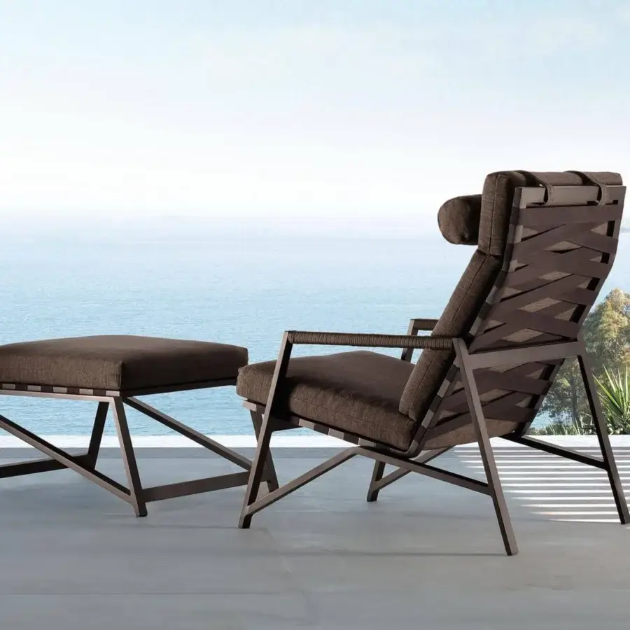 Sophisticated Talenti Cottage lounge chair with a refined aluminum frame and interwoven brown elastic belts upholstered in luxurious brown textile