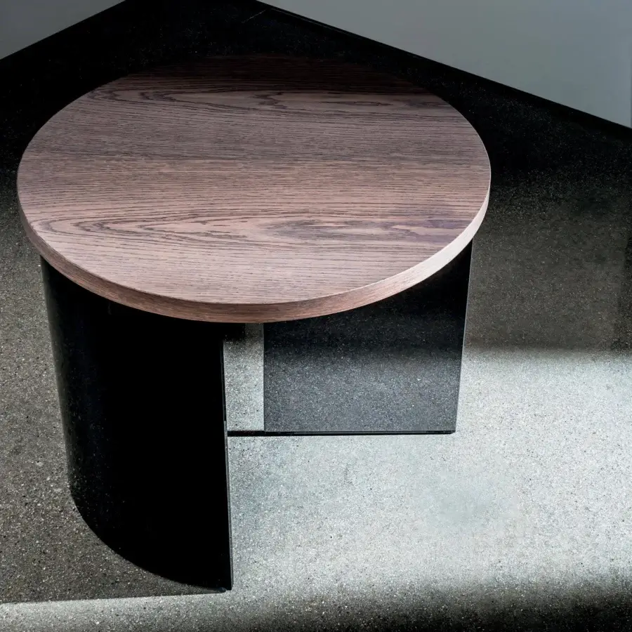 Exceptional Sovet Italia Regolo coffee table with a round wood top and uniquely crafted smoked glass with black lacquered laminated glass base