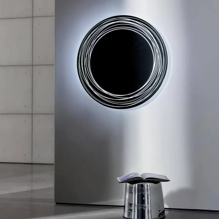 Elegant Sovet Italia Vertigo mirror with special engraving and illuminated white rings creating a halo effect
