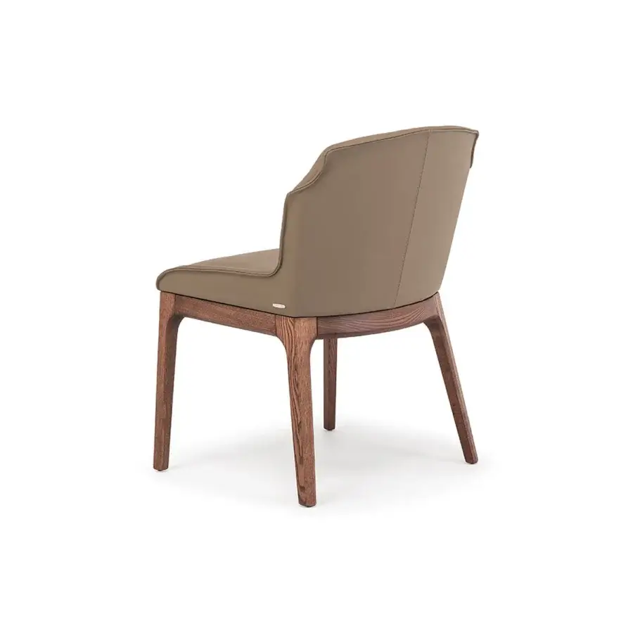 Refined Cattelan Italia Musa chair upholstered in smooth brown synthetic material with a dark-stained solid wood base