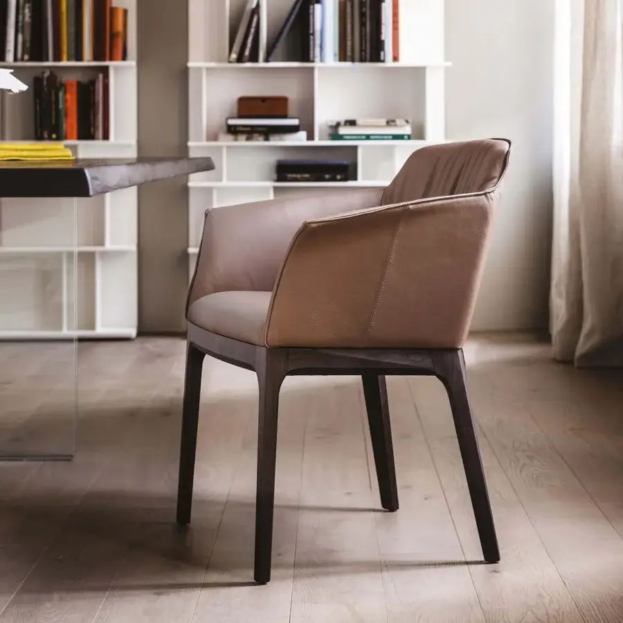 Elegant Cattelan Italia Musa chair upholstered in light brown leather with a dark-stained solid wood frame and stitched detail