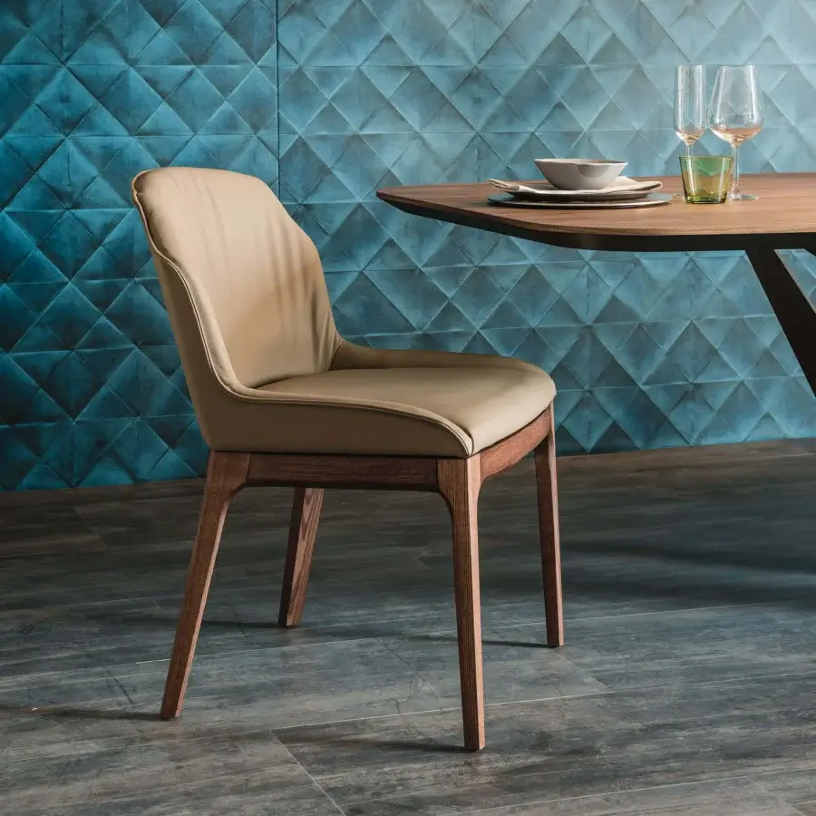 Superior Cattelan Italia Musa chair upholstered in light beige material with a dark brown finished solid wood base