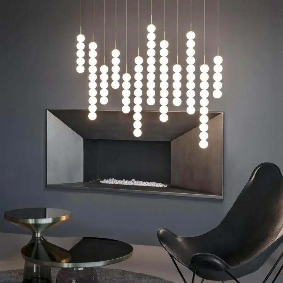 Exceptional Terzani Abacus multi light suspension lamp with refined round diffusers in brass and satin white glass with gold finish