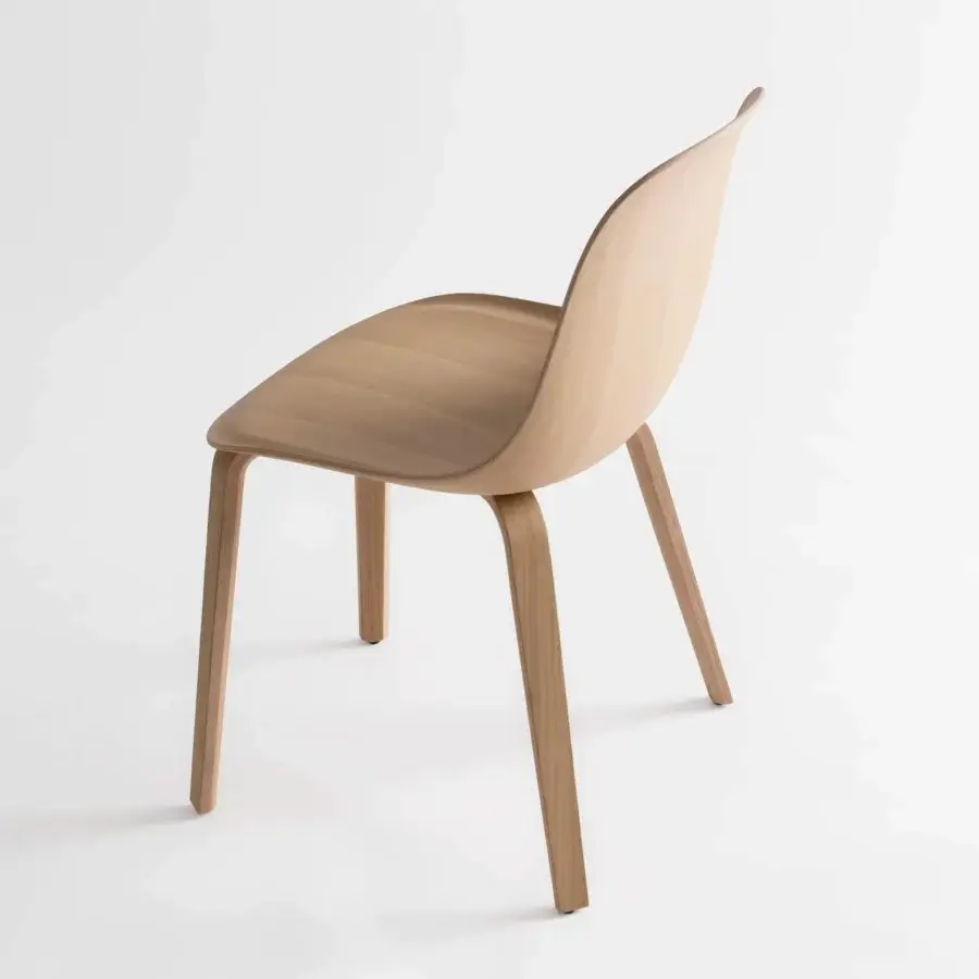 Exceptional MDF Italia Press chair crafted in bleached beech plywood emulating upholstered seating with a three-dimensional veneer finish