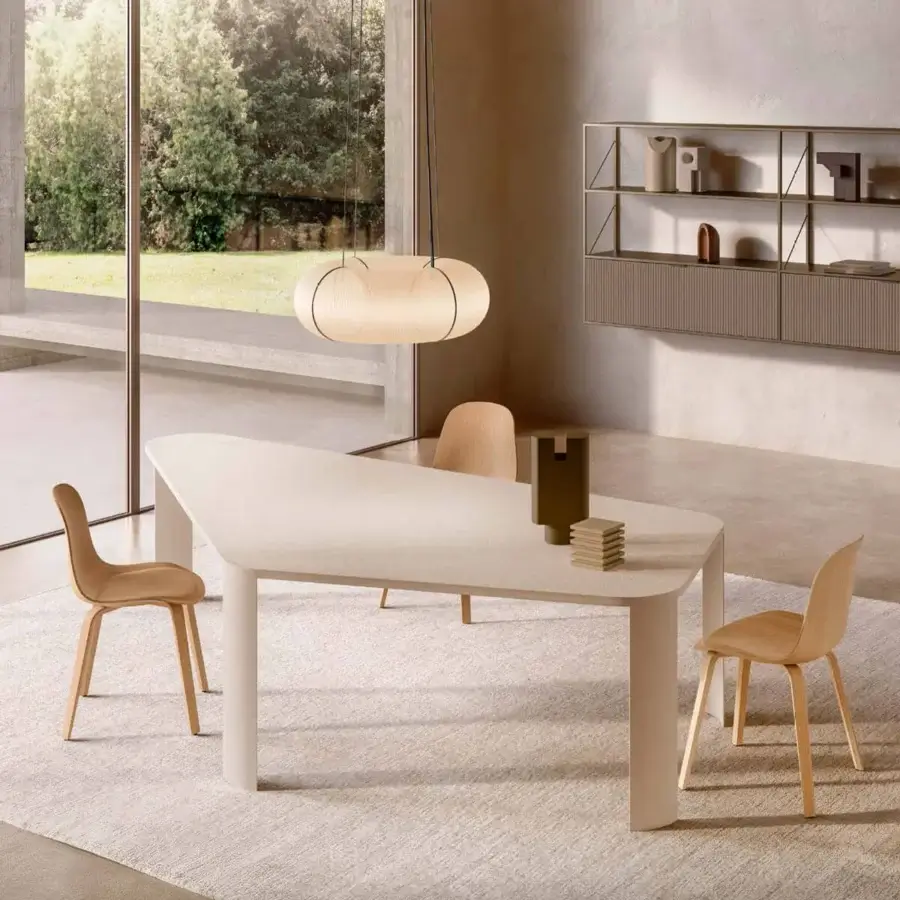 Innovative MDF Italia Press chair built in bleached beech plywood with a four-legged base and organic silhouette