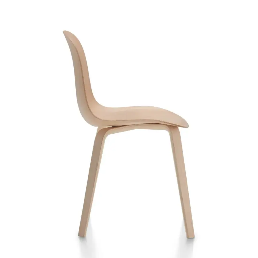 Superior MDF Italia Press chair in curved bleached beech plywood with a light natural tone and sculpted shell design