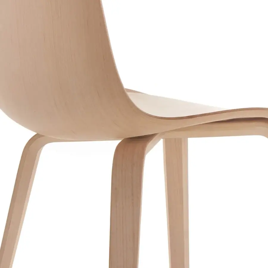 Innovative MDF Italia Press chair in three-dimensional beech plywood with a light beige smooth matte finish