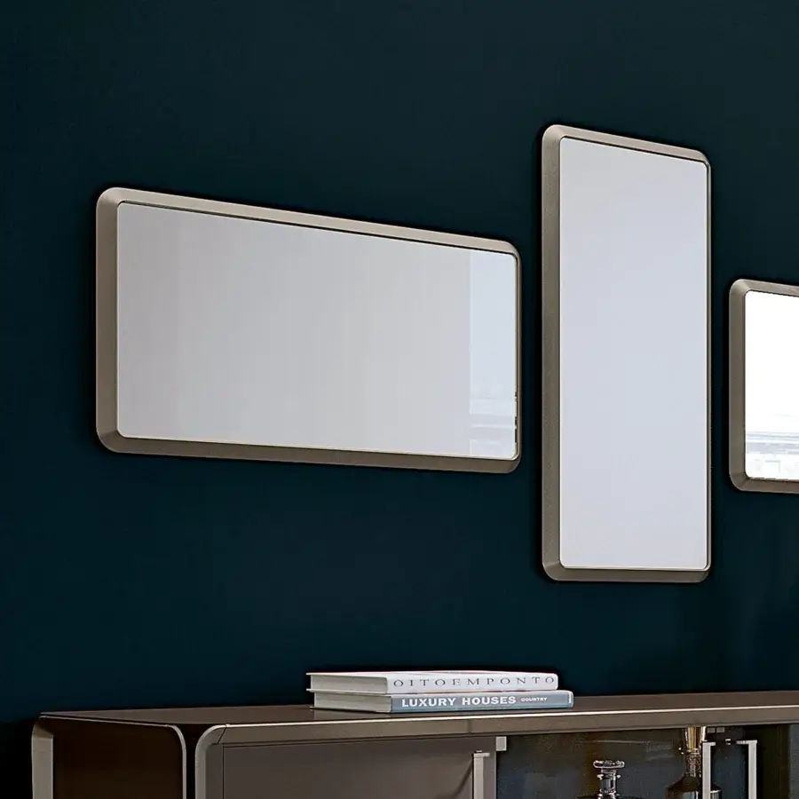 Elegant Turri Milano mirror crafted in brushed nickel metal with a smooth light bronze finish
