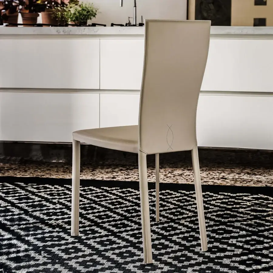 Elegant Cattelan Italia Nina chair crafted in real leather with subtle stitched detailing and matte finish