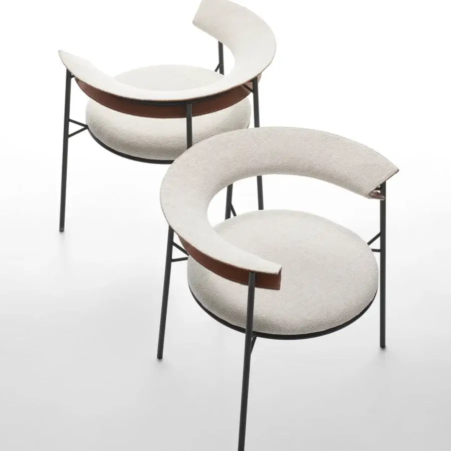 Superior MDF Italia Cantle lounge chair with curved backrest upholstered in light beige textile and saddle leather with matt graphite grey finish