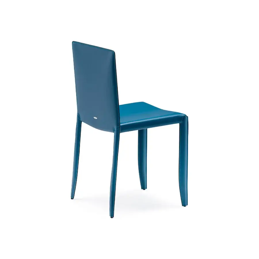 Distinguished Cattelan Italia Piuma Edition chair in vibrant blue leather with sleek angular silhouette and refined Italian craftsmanship