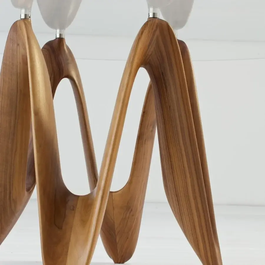 Exceptional Sovet Italia Lambda table with tempered glass and sculpted Canaletto walnut wood base
