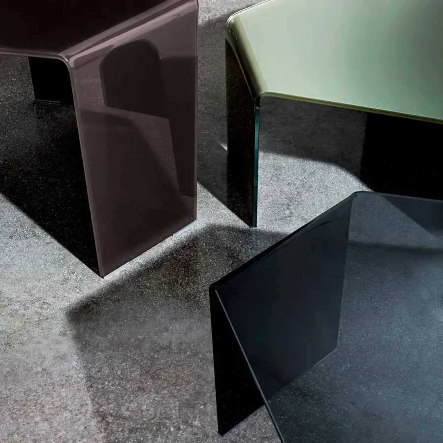 Elegant Sovet Italia coffee table with a bent glass hexagonal top and glossy black finish
